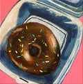 A chocolate rainbow sprinkle donut in a to-go container